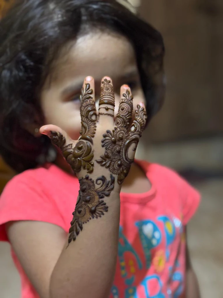 Portrait Mehendi design on hands, Bangalore